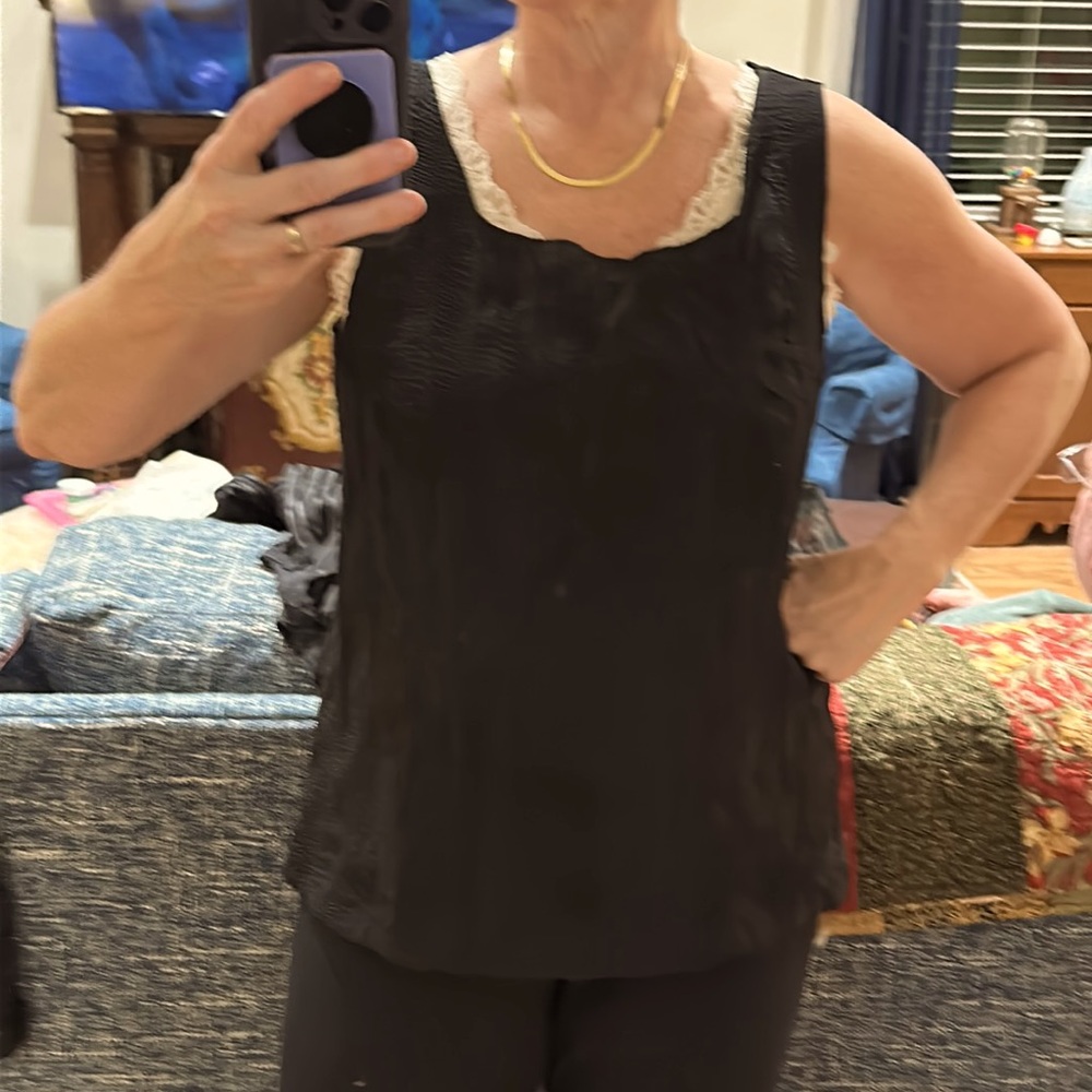 Black shell with squared neckline and hem. Flattering and so comfy and classy